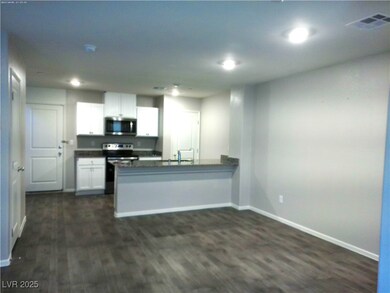 Kitchen featuring appliances with stainless steel