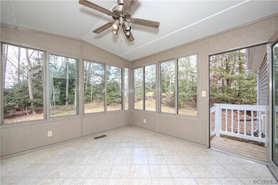 sunroom featuring a healthy amount of sunlight and