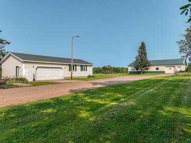 View of front of property with a front yard and a 