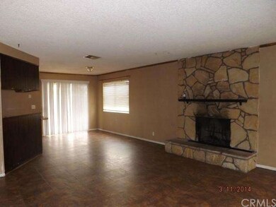 Kitchen area next to Fireplace. 