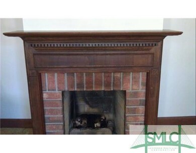 Other. Parlor Fireplace with Gas Logs and Custom M