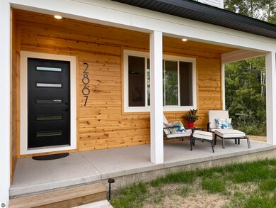 2867 E Sugar Maple Dr, Cedar, MI 49621 - photo 2