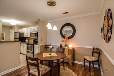 Formal dining room with updated floor, crown moldi