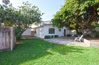 Back yard area with nice side patio.  Gate to inte