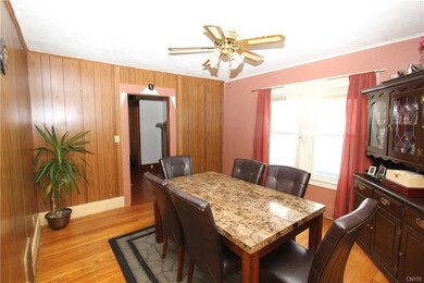 View of dining room from kitchen doorway and into 