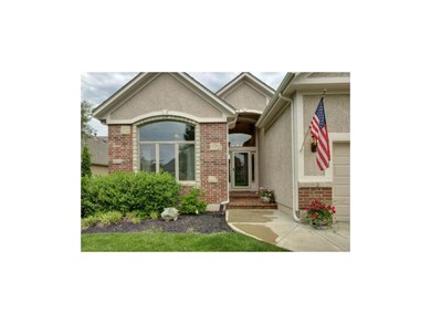 Custom stonework and brick entry welcome you home!