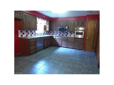 Eat in Kitchen, ceramic tile floor. Refaced cabine