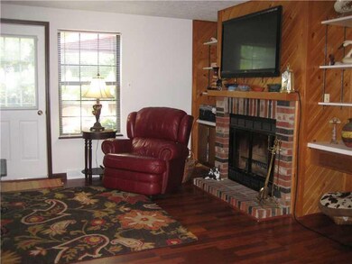 Living Room. Gleaming hardwood floors, fireplace a