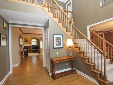 Two Foyer with gleaming hardwoods