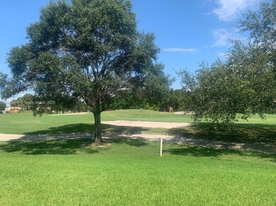VIEW FROM  COURTYARD. 6TH GREEN
