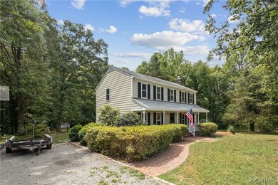 View of front of property featuring a porch and gr