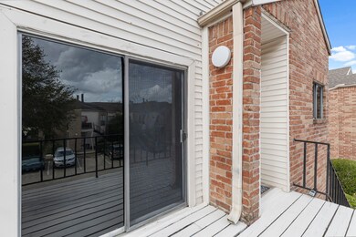 Great view of the sliding glass door to balcony.