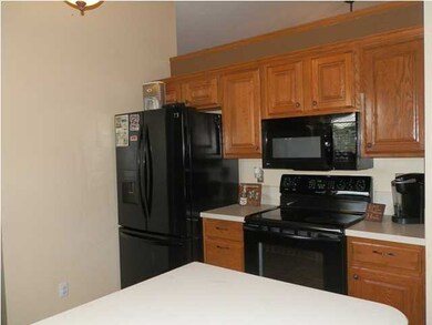 Kitchen with corian counter tops