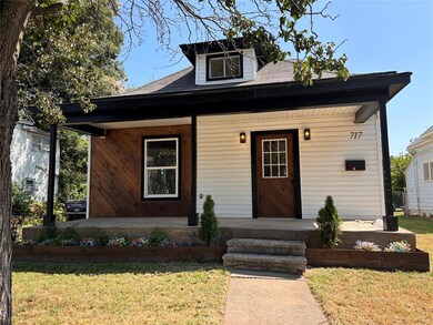 View of front of home featuring a front yard and a