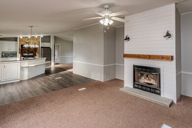 Two separate living spaces - this one features a wood-burning stove.