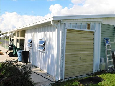 Golf cart storage and work shop.