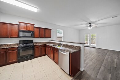 Stainless steel & black appliances.
