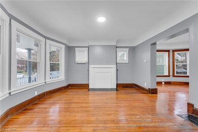 Unfurnished living room featuring light hardwood / wood-style floors