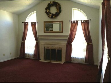 Living Room. Large living room with Cathedral ceil