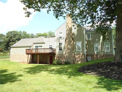 Exterior Back. Expansive back yard. Rear deck acce