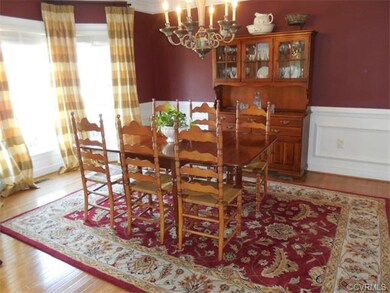 The formal Dining Room features upgraded trim, har