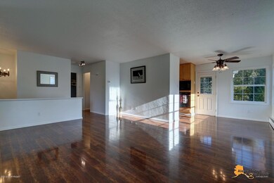 Living room with dining area and kitchen