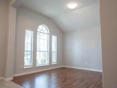 Great lighting and formal dining room upon entry.