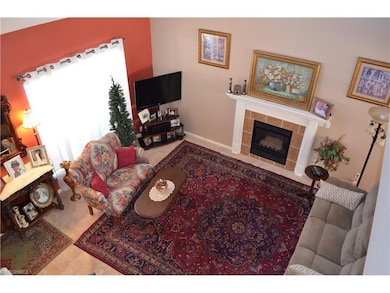Great room with two-story, vaulted ceiling