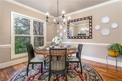 new paint and upgraded lighting in dining room. Wood clad windows are hard to come by these days