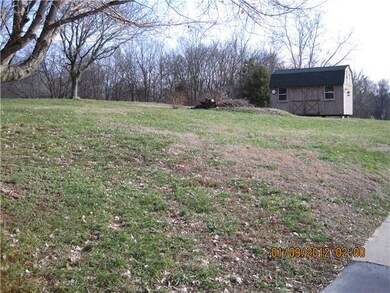 THIS STORAGE BUILDING STAYS WITH THE PROPERTY AND IT COMES WITH ITS OWN RIDING MOWER....