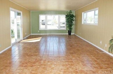Huge Added Living Room with Tile Flooring