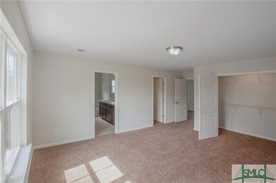 The master suite features 2 walk-in closets! No mo