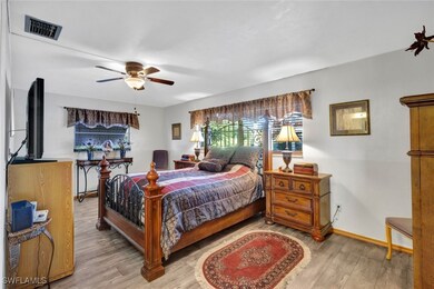 The Primary Bedroom is large with vinyl flooring a