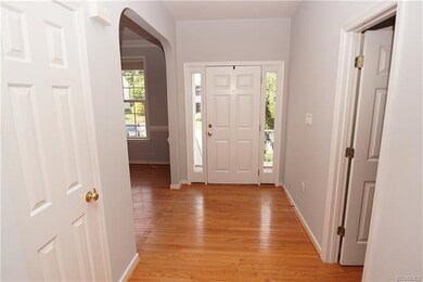 View of the Foyer, with side light windows, from t
