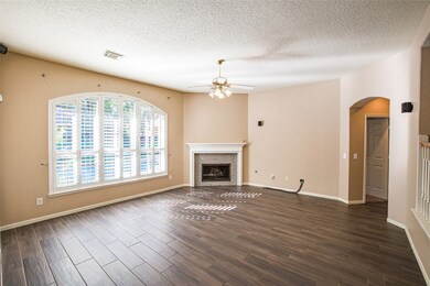 Open living space with fireplace overlooking the b