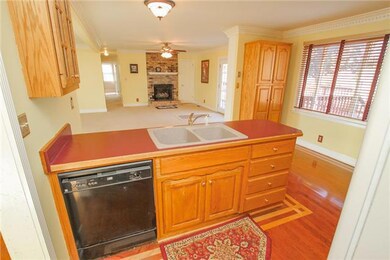 The Kitchen offers Oak Cabinets and a New Range.