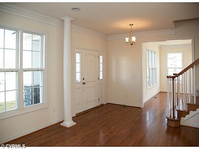 Foyer - Foyer with light fixture, Hardwood Floorin