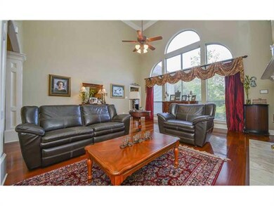 Photo. Nicely appointed den with gas fireplace, bu