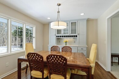 Informal dining area with custom built in, new lig
