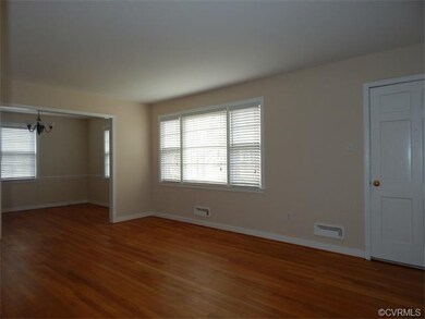Enter into a very large Living Room that is open to a beautiful Dining Room! There is plenty of space for that extra large furniture!