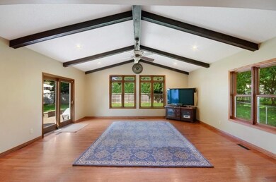 Four season addition overlooking private fenced ba