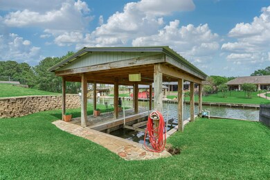The boat house also has a stone walkway and patio for enjoying the water views!