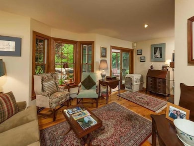 Living Room. Off this charming room...