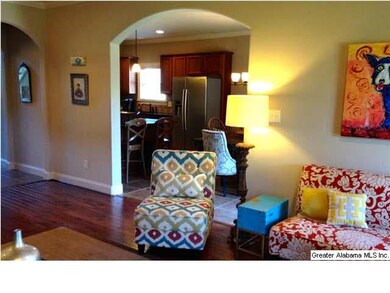 Family room has an open floor plan feel, due to ar