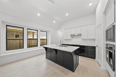 Black trim windows throughout
