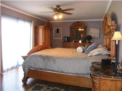 The master suite includes access to a future deck 