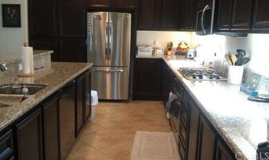 SPACIOUS KITCHEN WITH LOTS OF CABINETS FOR STORAGE