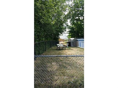 Yard/Garden. Fenced in back yard leading to storag