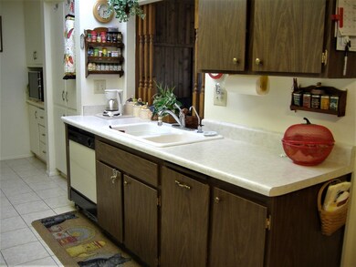 KITCHEN WITH PASS THRU TO AZ RM