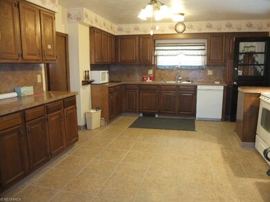 Eat in kitchen with new dishwasher and large pantr